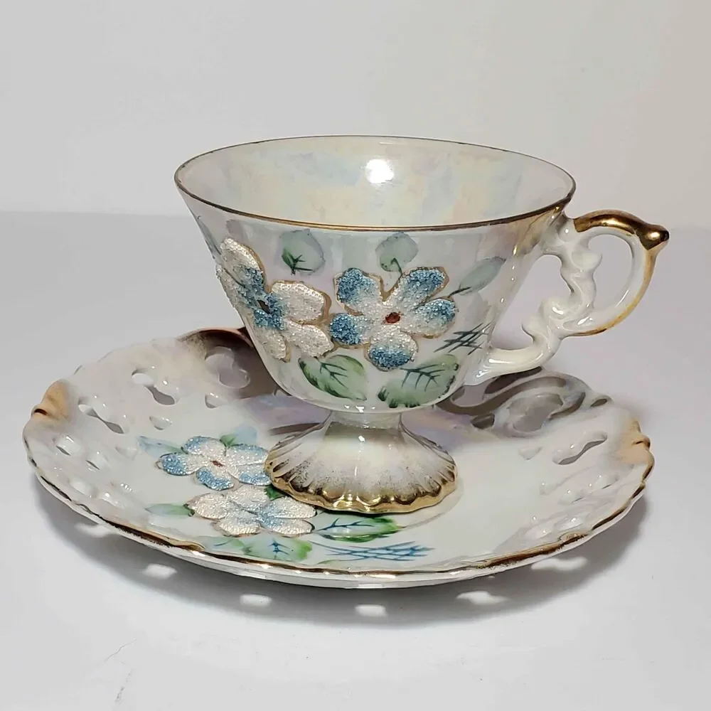 EFCCO Teacup and Saucer Blue White Textured Flowers Reticulated Opalescent